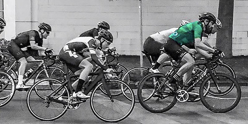 CYC rider leading a bike race