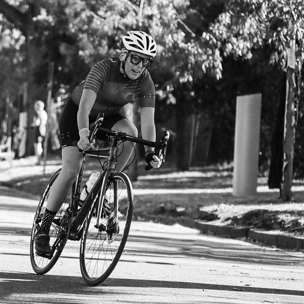 Cyclist cornering in a bike race