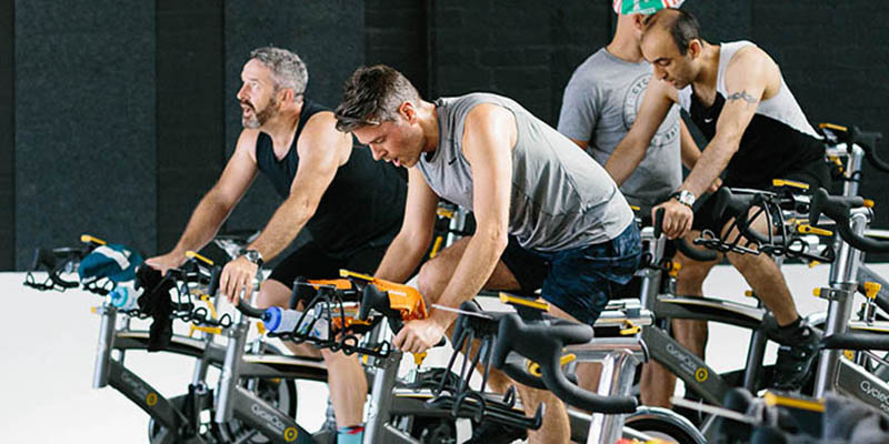 Group of men training with Adam
