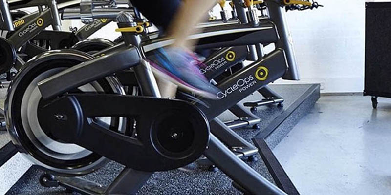 Leg spinning fast on indoor bike pedals